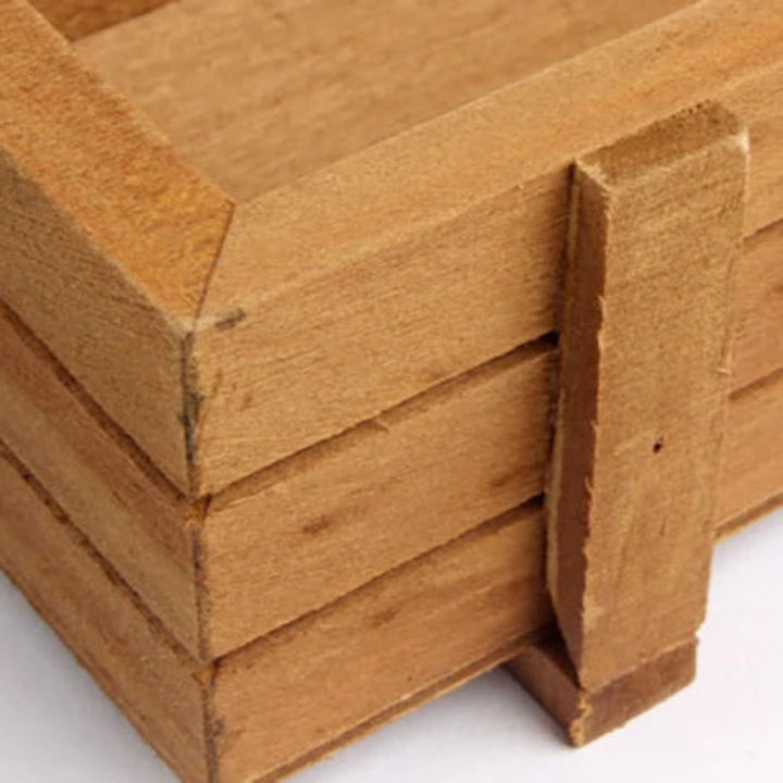 Close-up of vintage-style wooden crate with smooth finish, perfect for small indoor plants