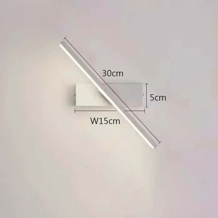 Rotatable LED Wall-mounted light fixture with dimensions on a plain wall.