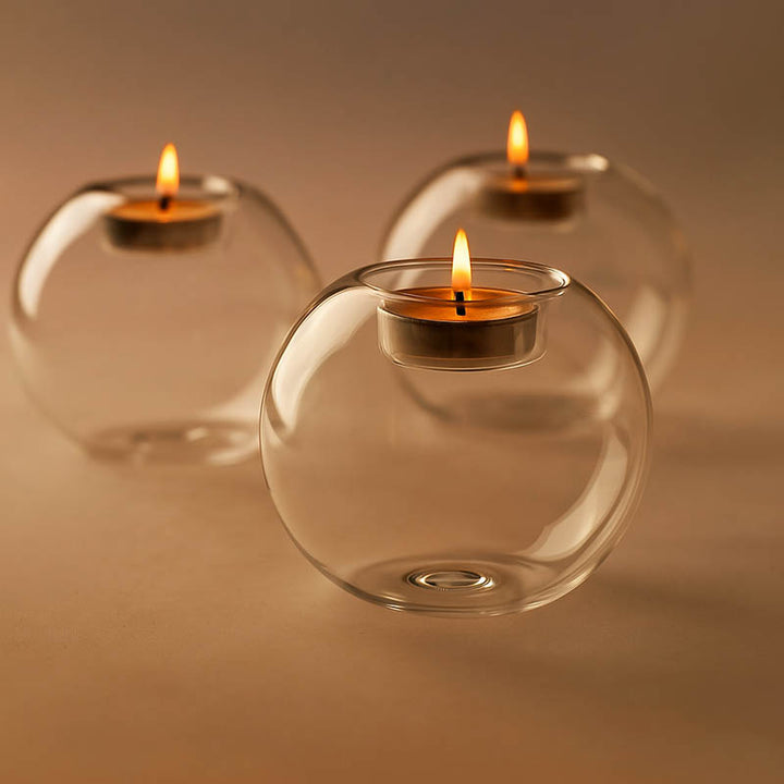 Set of three round glass tealight candle holders for cosy uk Scandinavian-inspired home decoration