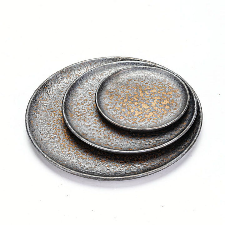 Three-piece rustic stoneware serving plate set, shallow ceramic, grey speckled finish, 22/17/12 cm