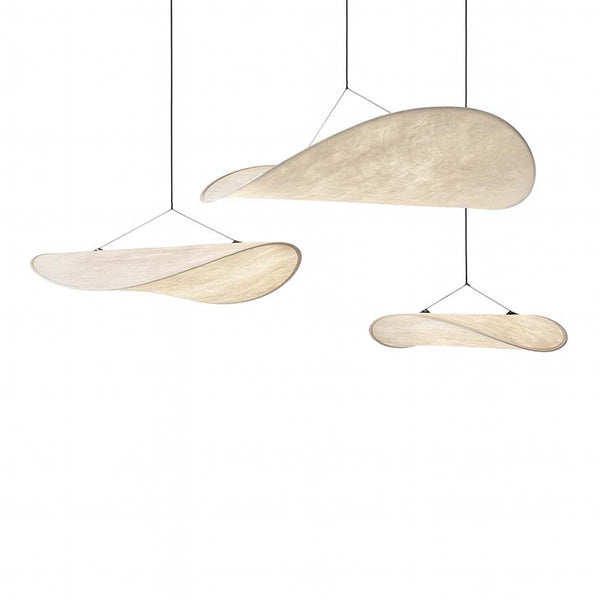 Modern pendant light with three hanging lampshades on a white background