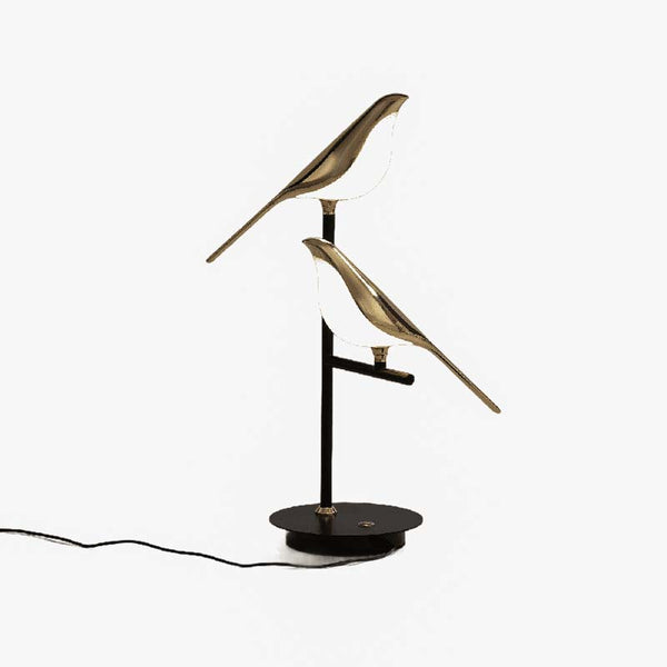 Decorative lamp with bird designs on a white background