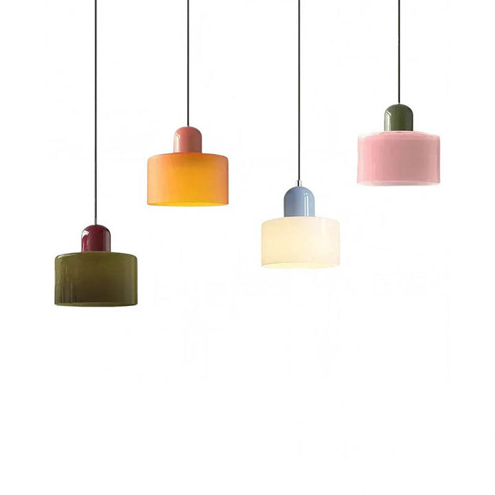 Set of five colourful Nordic glass pendant lights in green, orange, blue, pink, and yellow tones, modern minimalist design.