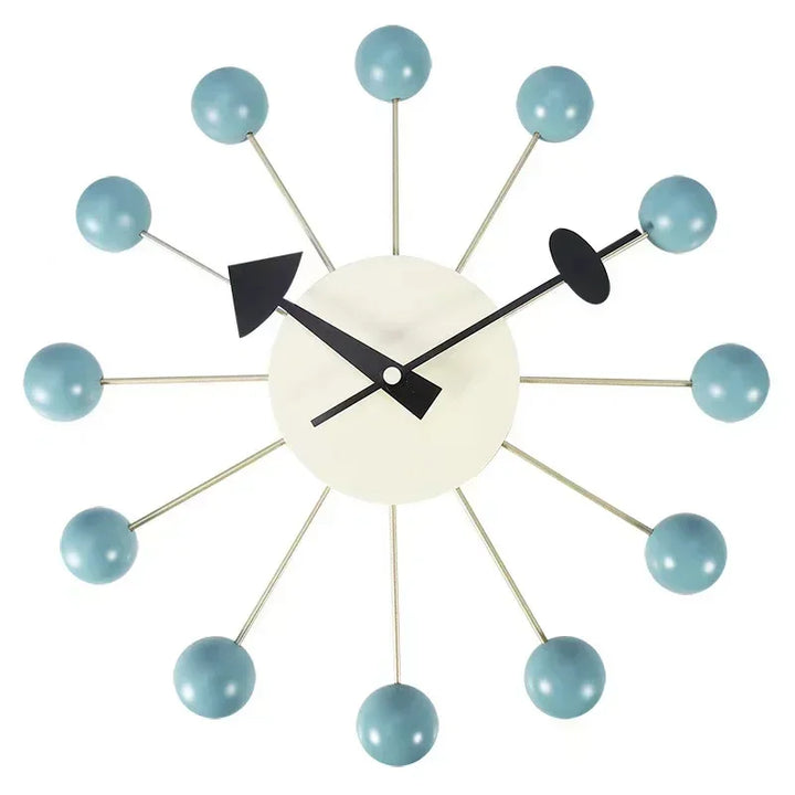 Nordic-inspired wall clock with blue wooden ball accents and silent quartz movement