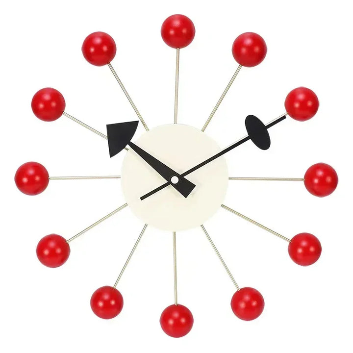 Scandinavian silent wall clock with striking red ball accents and clean white frame