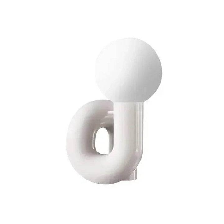 Glossy white resin base table lamp with spherical LED shade in Scandinavian modern style, ideal for shelf or nightstand use.