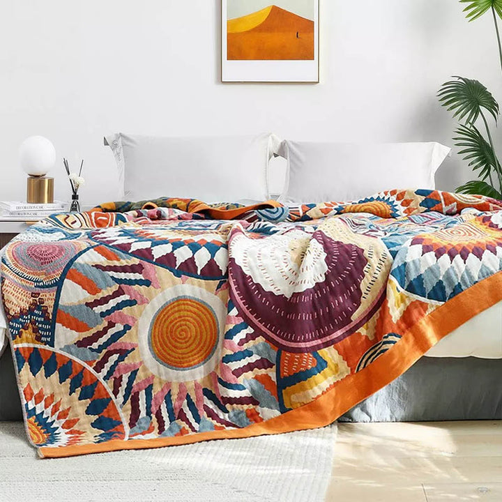 Nordic cotton throw blanket, soft woven comfort, colorful abstract pattern on bed, UK