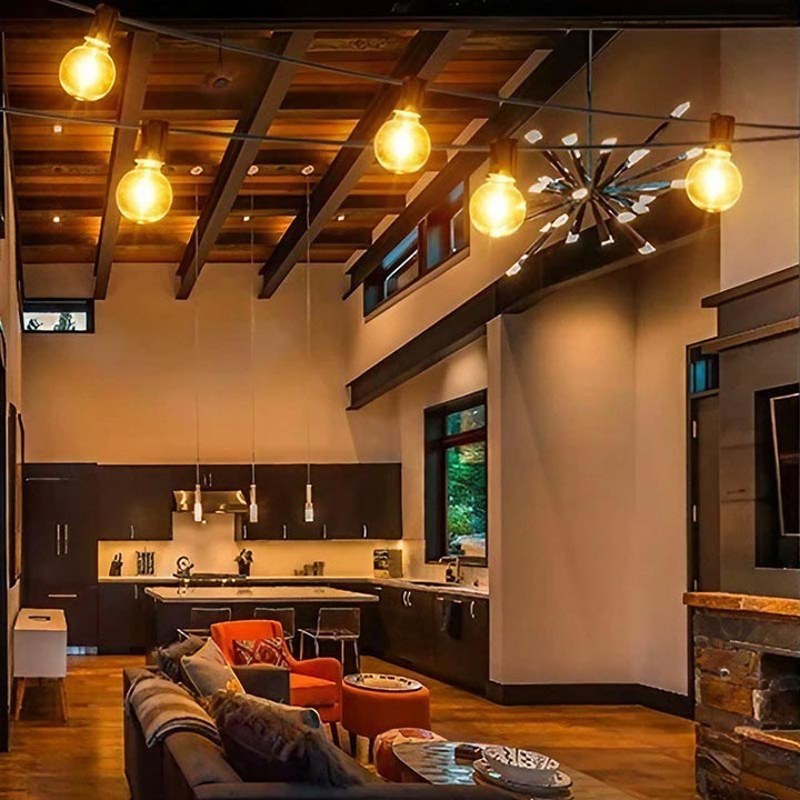 String lights adding ambient lighting in an indoor loft-style dining room, showcasing versatile indoor use.