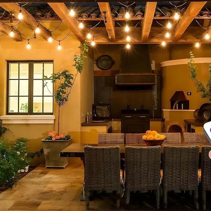 LED garden lights hanging under covered patio roof, showcasing year-round waterproof functionality.