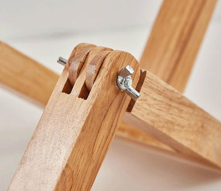 Close-up of TRAEMAN wooden creative table lamp's adjustable joint, ideal for home decor