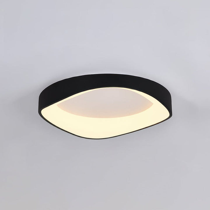 Black LED ceiling light with curved profile, modern Nordic flush mount for living room or bedroom