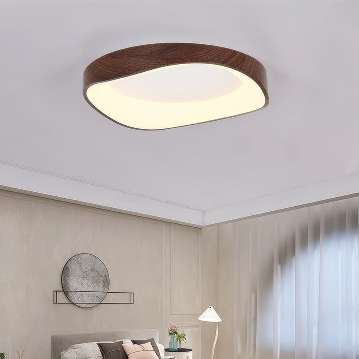 Walnut grain ceiling light with curved LED panel, Nordic eco-friendly flush mount for interiors
