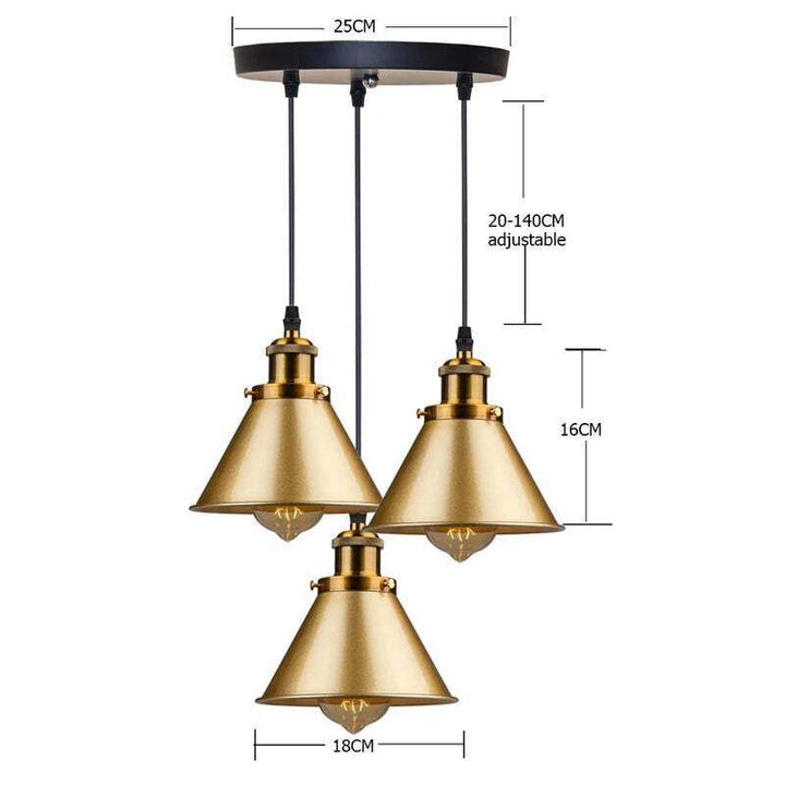 Trio gold vintage pendant lights with round ceiling plate and adjustable hanging cords.