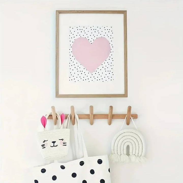 Wooden wall-mounted coat hooks in Scandinavian design, perfect for entryway or hallway organisation