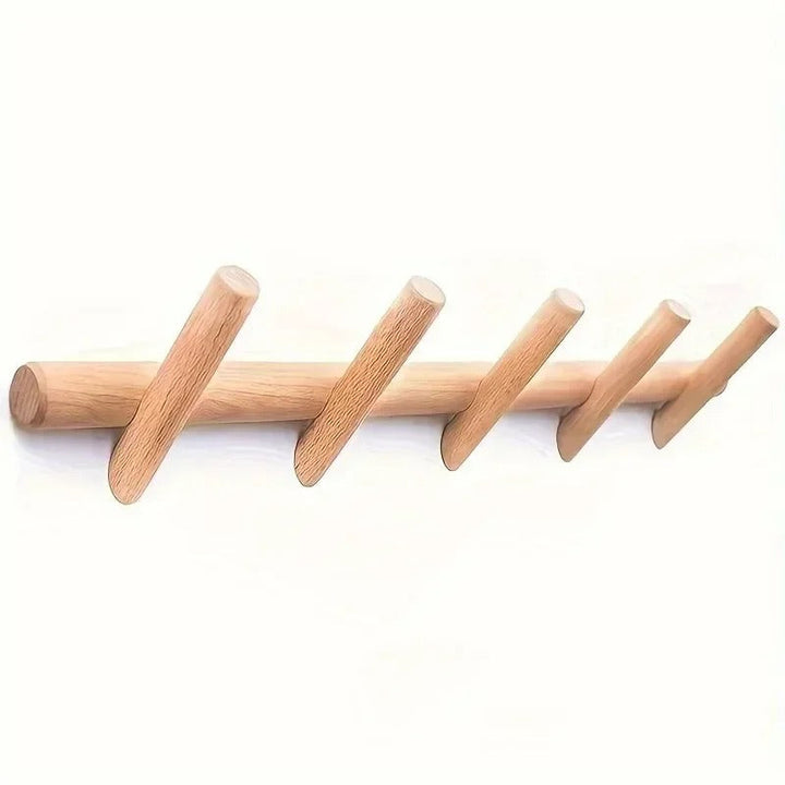 Scandinavian oak wall coat rack in clean, natural finish, designed for functional and aesthetic home storage