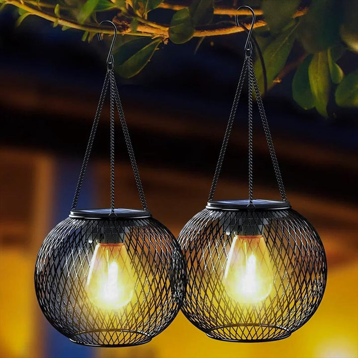 Waterproof decorative solar lantern hanging in rain, ideal for garden, patio, or balcony lighting.