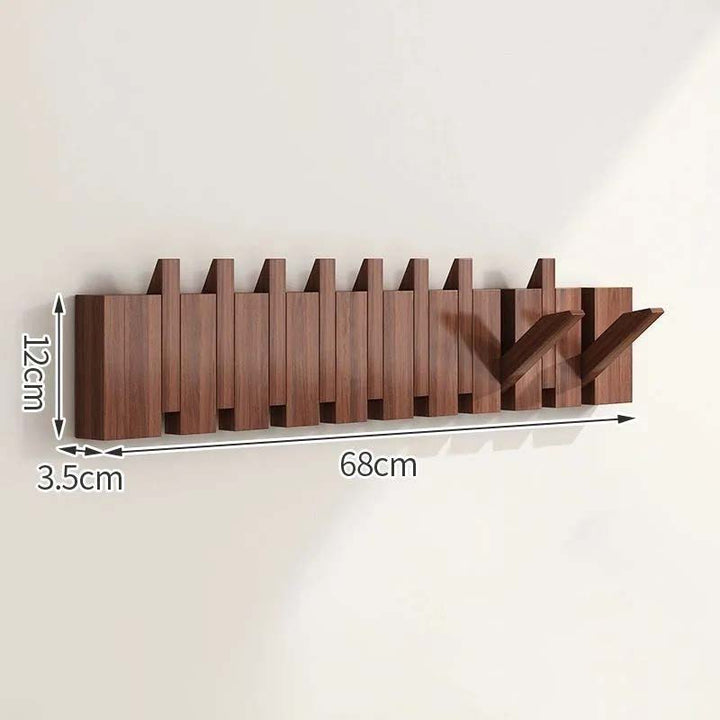 Wooden wall-mounted coat rack with dimensions indicated on a white background