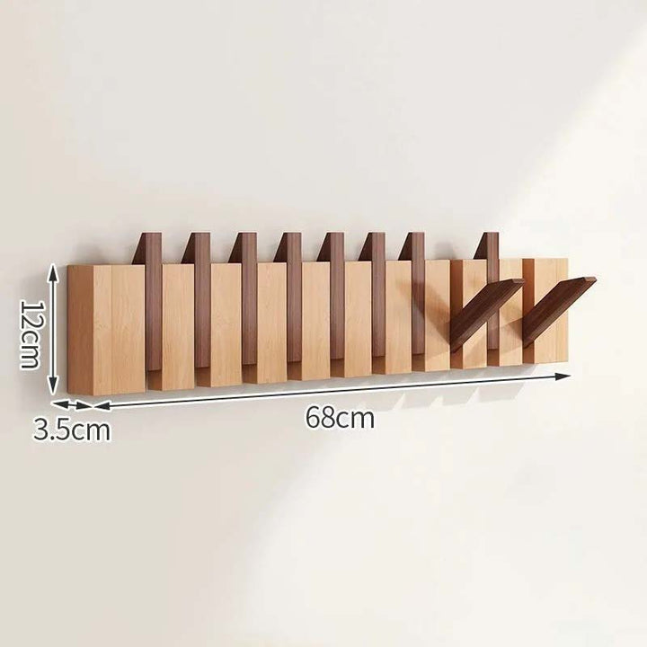 Wooden wall-mounted coat rack with dimensions indicated on a white background