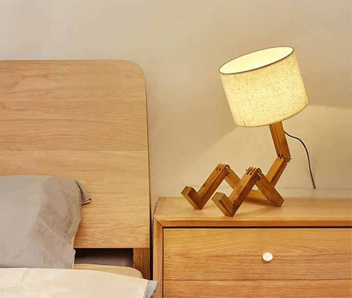 TRAEMAN wooden creative table lamp with linen shade on a bedside table, warm home decor