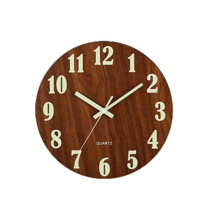 Wooden wall clock with white numbers and hands on a white background