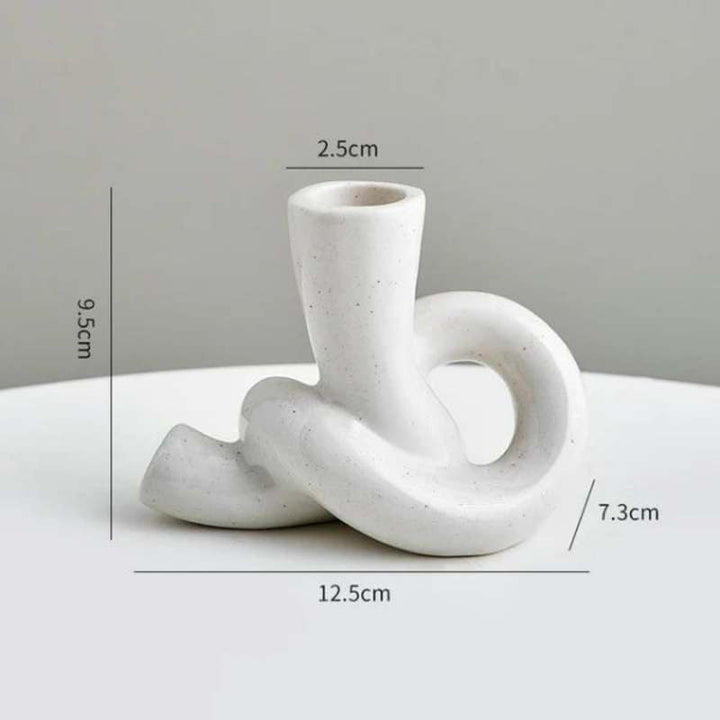 White ceramic knot candle holder with Nordic minimalist design and size dimensions