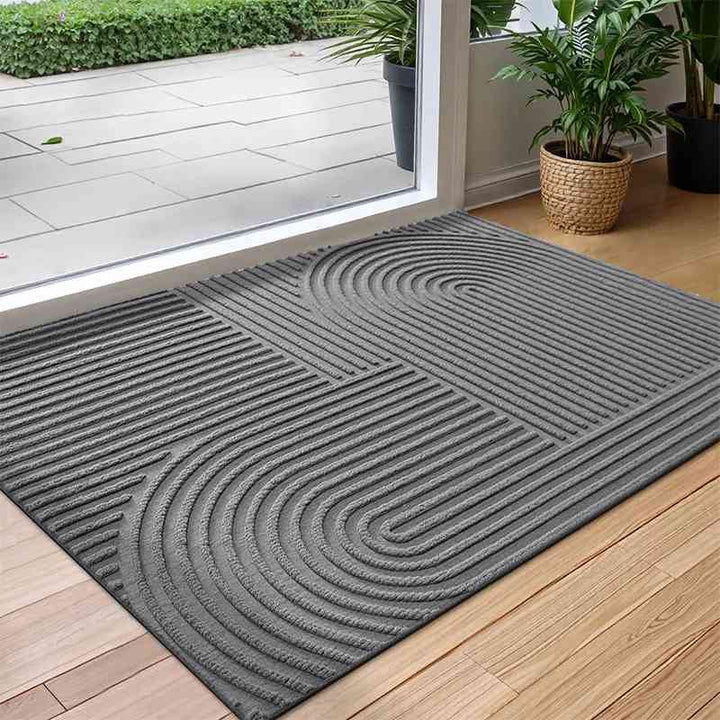 Scandinavian-inspired grey anti-slip door mat with a Time arc pattern, featuring a quick-dry, water-absorbent polyester surface.