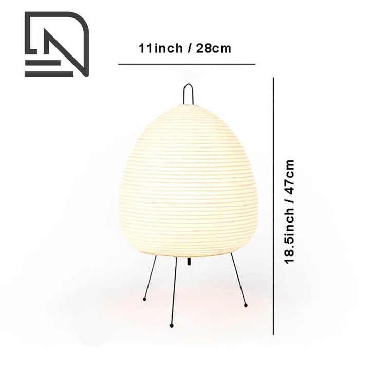 Minimalist AKARIS lantern lamp with round white rice paper shade and black legs, modern Japanese-Scandi lighting design